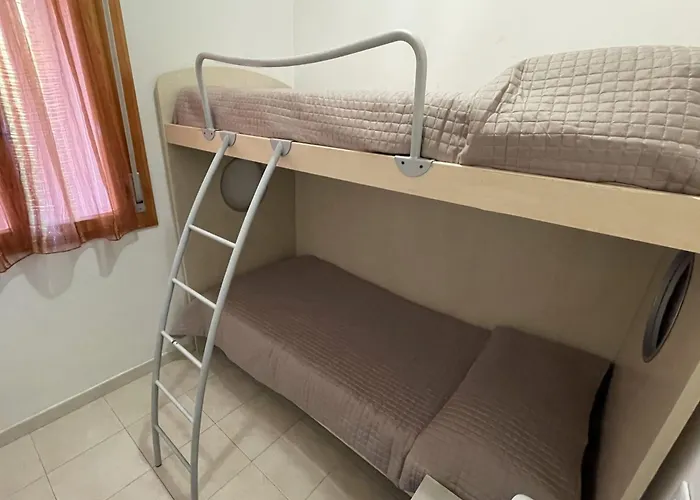 Апартаменты Flat In A House With Shared Pool Бибионе